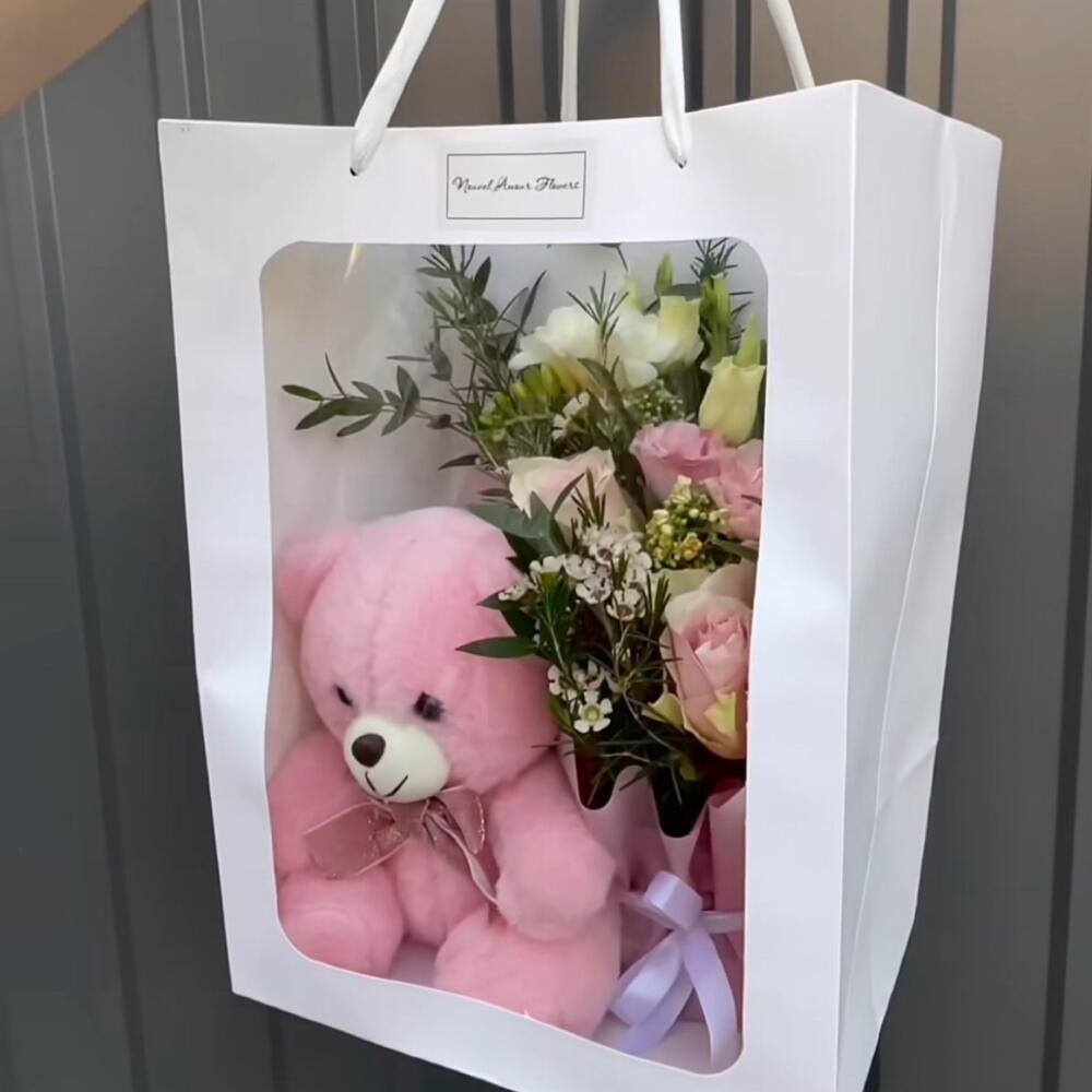 Ведмежа з квітами  uvel